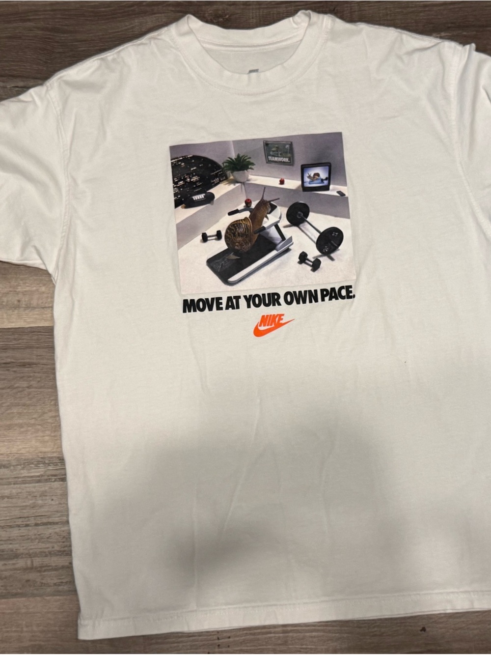 Nike White Graphic 'Move At Your Own Pace' Tee with Orange Logo